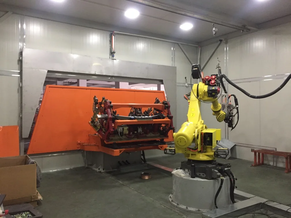 Robot welding station with turntable